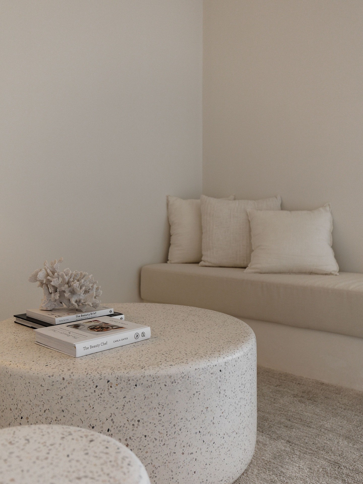 Waiting area with neutral furnishings inside a boutique skin clinic